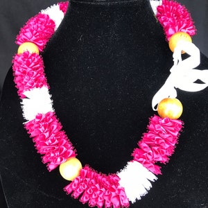 Maui&#39;s color is this bright pink ribbon. Creating lei in everlasting style resembles true floral plumeria leis. Handmade Maui Feather Lei