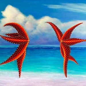 May include: Two red starfish with white polka dots are standing on a white sandy beach with blue water in the background. The starfish are facing each other and appear to be dancing.