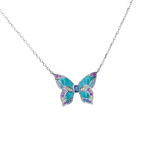 May include: A silver butterfly pendant necklace. The butterfly has turquoise enamel wings, accented with pink, blue, and clear gemstones. A small blue gemstone is in the center. The necklace chain is delicate and silver.