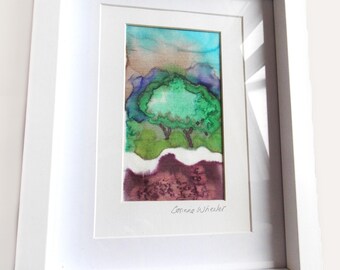 Green and brown silk painting, framed. Countryside landscape, with trees. Abstract Art (17cm x 22cm).