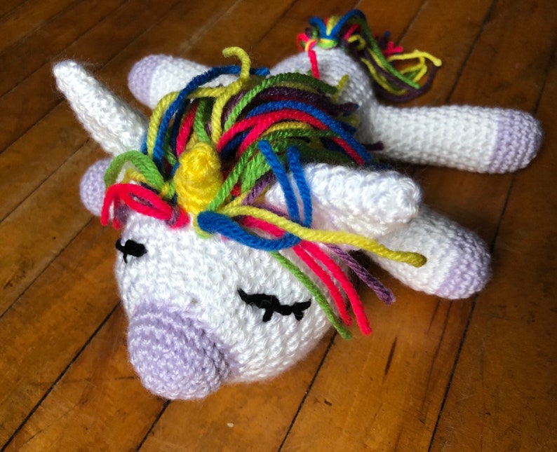 Sleeping crochet unicorn plush lavender snout