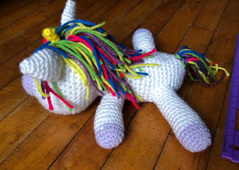 Sleeping crochet unicorn plush lavender snout