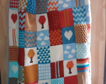 Coperta patchwork con motivo all'uncinetto