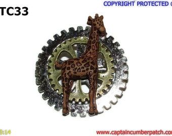 Steampunk pin badge brooch resin giraffe on silver and bronze cogs / gearwheels #TC33