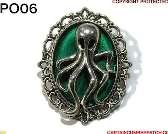 Steampunk pin badge brooch silver octopus / kraken on green & silver backing  #PO06