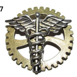 Steampunk pin badge brooch silver caduceus on large bronze cog / gearwheel #NC07