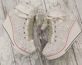 white converse wedge trainers