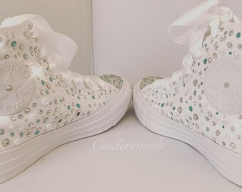 turquoise high top converse
