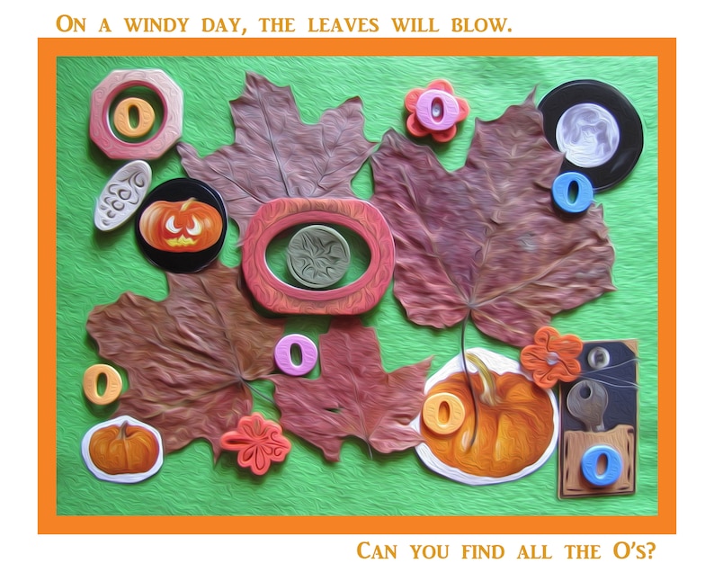 May include: A green background with brown maple leaves, a pumpkin, and various shapes with the letter "O" on them. The text "ON A WINDY DAY, THE LEAVES WILL BLOW." is at the top of the image. The text "CAN YOU FIND ALL THE O's?" is at the bottom of the image.
