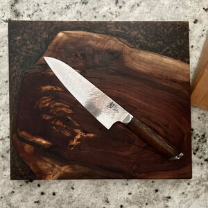 Walnut and epoxy cutting board