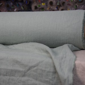 IN STOCK. Pure 100% linen fabric Gloria Antique Jade 200gsm (5.90oz/yd2). Middle weight, dense, washed-softened. Greenish-gray.