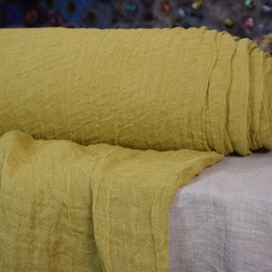 Temporarily OUT OF STOCK. Linen fabric Pura Sulpfur Yellow. Thin semi-sheer gauze. 100% linen 110gsm. Loosely woven. Washed-softened.