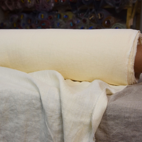 IN STOCK. Pure 100% linen fabric Gloria Vanilla 200gsm (5.90oz/yd2). Middle weight, densely woven. Yellowish cream ivory off-white tint.