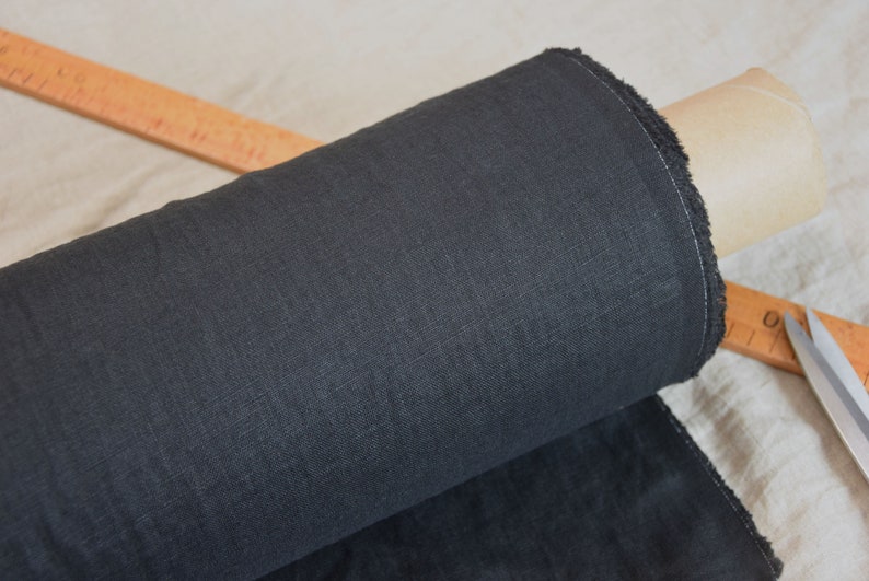 Pure linen fabric Gloria Black. Middle weight and middle thicknes, plain weave. The fabric is dense, not sheer, soft. Drape characteristic are good. Rich and deep black colour.