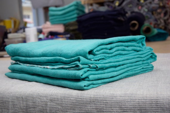REMNANTS SALE!!! Thin semi-sheer pure 100% linen fabric Serena Carnival Glass 95gsm(2.80oz/yd2). Pantone 13-6030 medium light green-cyan.