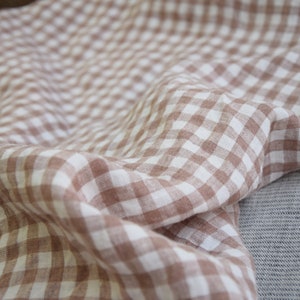 100% lniana tkanina „Aurora Rosy Nut Gingham” 150 g/m2 (4,50 oz/yd2). Kratka 8 mm. Prana-zmiękczana. Naturalnie pomarszczona. Tymczasowo NIEDOSTĘPNA.