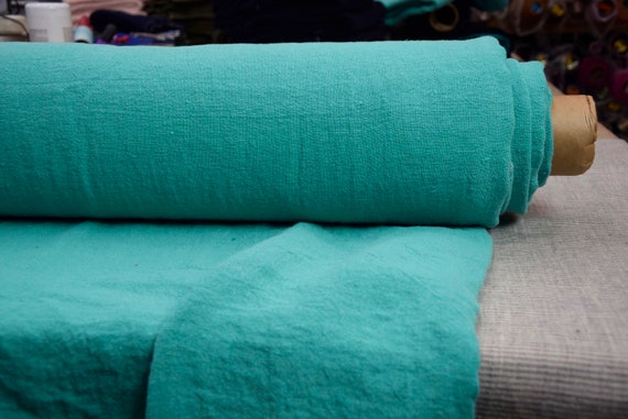 Temporarily OUT OF STOCK. 100% linen fabric Julia Carnival Glass 210gsm(6.20 oz/yd2). Pantone 13-6030 is medium light green-cyan.