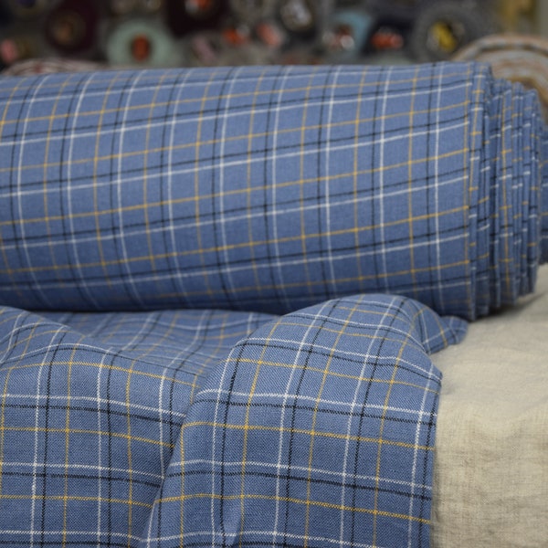 IN STOCK. 100% linen fabric Margarita Blue Windowpane Check 200gsm (5.90oz/yd2). Blue background, white black yellow check. Washed-softened.