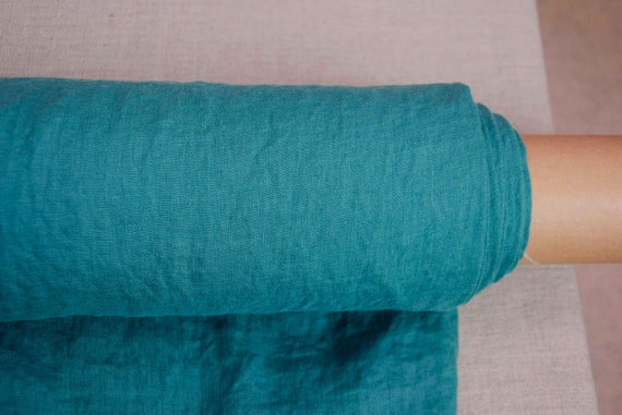 100% linen fabric Aura June Bug 125gsm (3.7oz/yd2). Pantone 19-5414 Deep teal-turquoise. Temporarily OUT OF STOCK. Custom dyeing available.