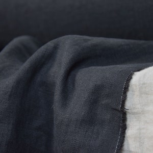 Pure linen fabric Gloria Black. Middle weight and middle thicknes, plain weave. The fabric is dense, not sheer, soft. Drape characteristic are good. Rich and deep black colour.