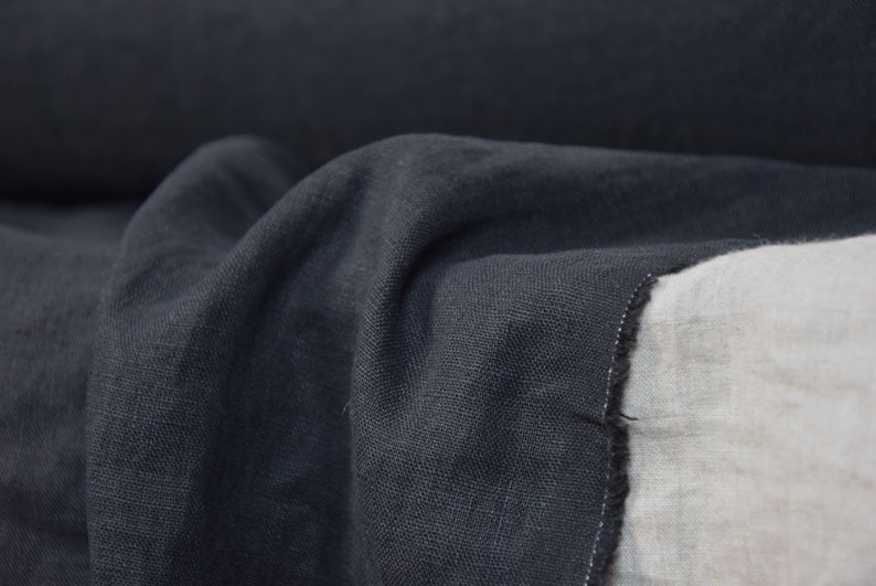 Pure linen fabric Gloria Black. Middle weight and middle thicknes, plain weave. The fabric is dense, not sheer, soft. Drape characteristic are good. Rich and deep black colour.