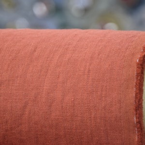 100% linen fabric orange brown color, so called rust color.