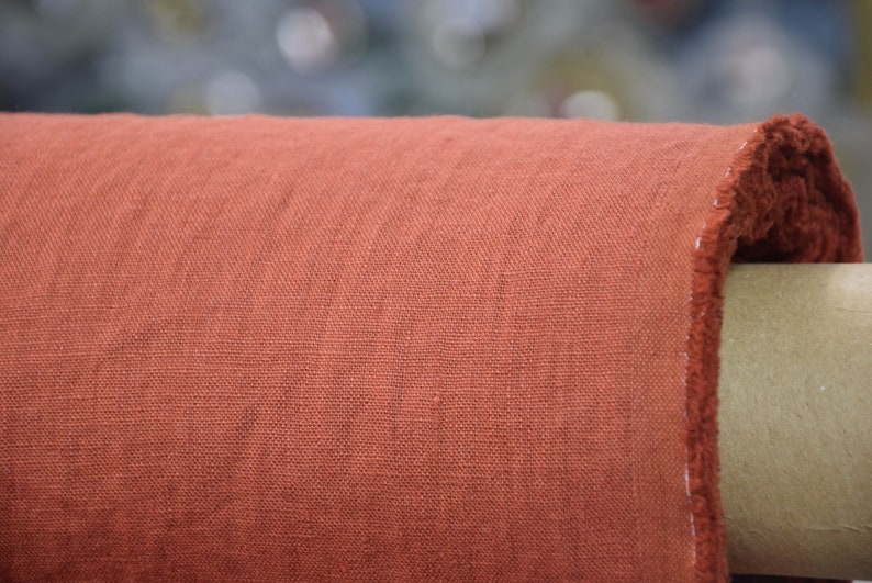 100% linen fabric orange brown color, so called rust color.