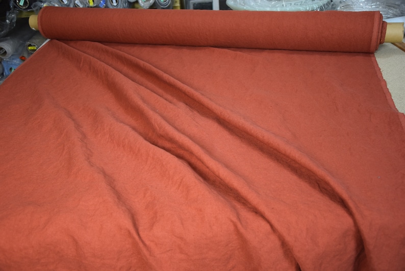 Pure linen fabric Udana Rust blends into any modern interior. 
The Rust color is saturated burnt brown-orange. Quite bright and highlighted, resembling iron oxide.