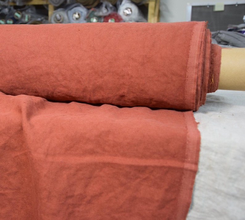 Pure linen fabric Udana Rust blends into any modern interior. 
The Rust color is saturated burnt brown-orange. Quite bright and highlighted, resembling iron oxide.