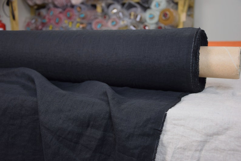 Pure linen fabric Gloria Black. Middle weight and middle thicknes, plain weave. The fabric is dense, not sheer, soft. Drape characteristic are good. Rich and deep black colour.