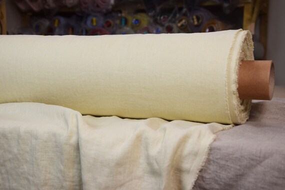 Fabric pure linen "Gloria Chardonnay" 200gsm. Pale beige with some greenish hue of white wine. Densely woven, softened. IN STOCK.