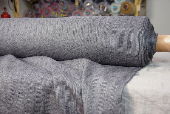 Temporarily OUT OF STOCK. Pure 100% linen fabric Digna Black 210gsm. Herringbone woven from undyed flax and black. Washed-softened.