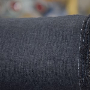 Pure linen fabric Gloria Black. Middle weight and middle thicknes, plain weave. The fabric is dense, not sheer, soft. Drape characteristic are good. Rich and deep black colour.