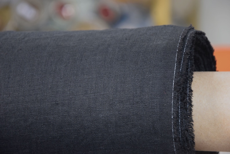 Pure linen fabric Gloria Black. Middle weight and middle thicknes, plain weave. The fabric is dense, not sheer, soft. Drape characteristic are good. Rich and deep black colour.