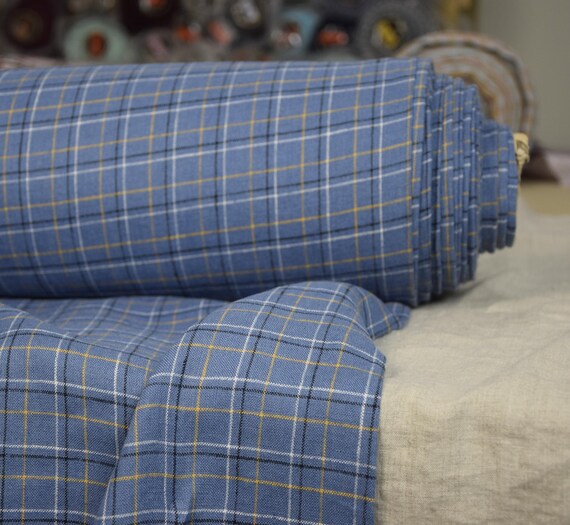 100% linen fabric "Margarita Blue Windowpane Check" 200gsm (6oz/yd2). Blue background, white black yellow check. Washed-softened. IN STOCK.
