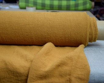 Temporarily OUT OF STOCK. 100% linen fabric Julia Orange Ochre 210gsm(6.20 oz/yd2). Orange-brown, mustard, golden, pre-shunk.