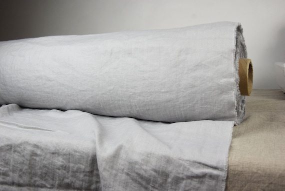 IN STOCK. Pure 100% linen fabric Gloria Dawn Sky 200gsm (5.90 oz/yd2). Pale gray with cool bluish-purplish shade. Washed-softened.