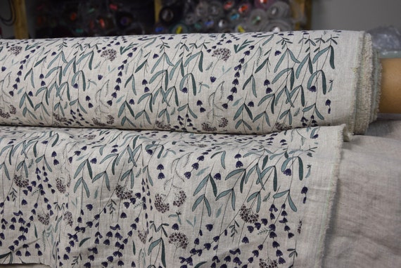 Pure 100% linen fabric "Gloria Lavender Flowers On Beige Melange" 200gsm. Printed flowers on beige linen fabric background. WHOLESALE.