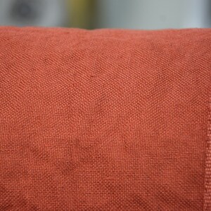 Pure linen fabric Udana Rust blends into any modern interior. 
The Rust color is saturated burnt brown-orange. Quite bright and highlighted, resembling iron oxide.