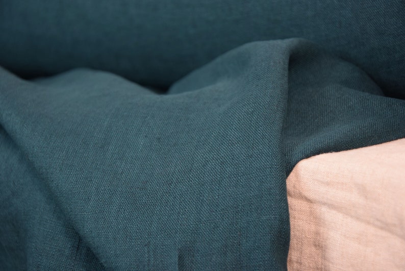 Pure linen fabric Gloria Slate Teal.  Blue and green, saturated dark teal is dressy and dramatic. A dose of black gives it a deep richness. Middle weight, dense, not sheer, plain. Washed-softened, will not  shrink any more.