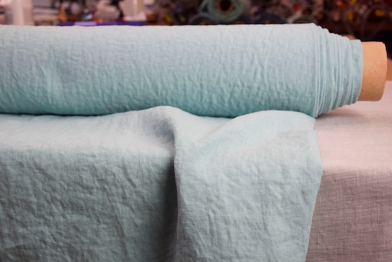 Pure 100% Linen Fabric "Gloria Tender Aqua" 200gr/m2 (6oz/yd2). Pale pastel blue-green Aquamarine. Preshrunk. Naturally Creased. IN STOCK.