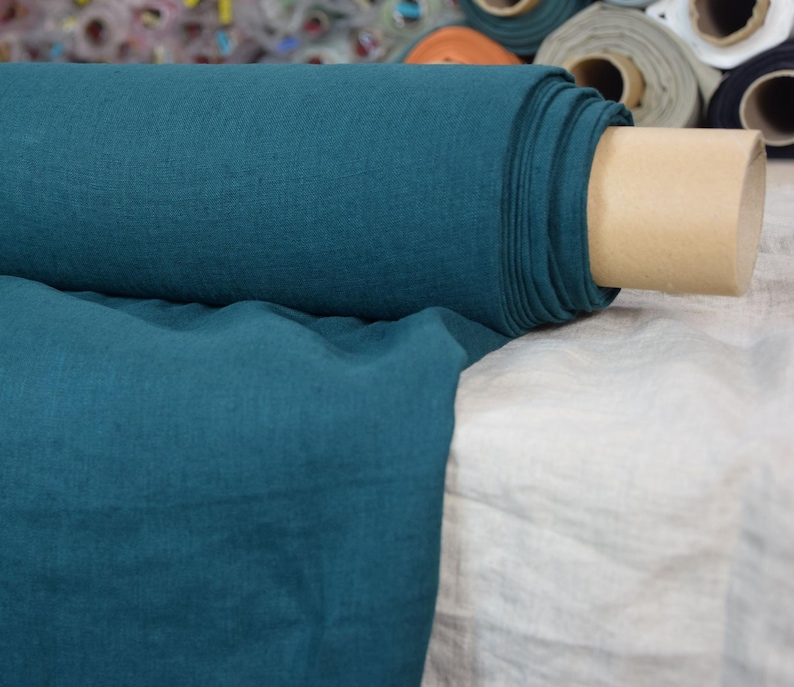 Pure linen fabric Gloria Slate Teal.  Blue and green, saturated dark teal is dressy and dramatic. A dose of black gives it a deep richness. Middle weight, dense, not sheer, plain. Washed-softened, will not  shrink any more.