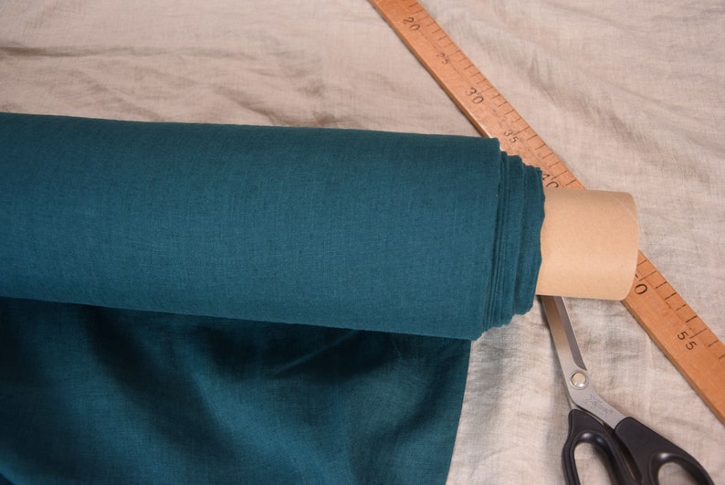 Pure linen fabric Gloria Slate Teal.  Blue and green, saturated dark teal is dressy and dramatic. A dose of black gives it a deep richness. Middle weight, dense, not sheer, plain. Washed-softened, will not  shrink any more.