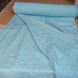 Pure linen fabric Terra Turquoise Gingham. Small mini 2mm vichy (gingham) checks. Quite bright, saturated  turquoise blue. Middle weight. Densely woven, not sheer.