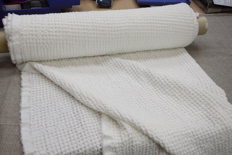 This fabric is aesthetic, strong and durable. 
Natural, organic, eco-friendly and antistatic. 
Relaxing, tranquil, breathing, pleasant to touch. Densely woven, fluffy, waffle pattern. 
Softened, washed, pre-shrunk. 
Machine washable or dry cleanable.