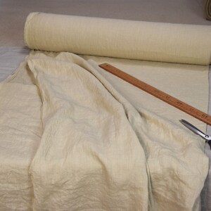 Pure linen fabric Regina Sesame. Light weight, not sheer. Pantone 15-1215 Tcx Sesame Color (beige color with some pale brownish-sand and greenish undertones). Drape characteristic are very good. Plain, densely woven. Pre-washed, naturally wrinkled.