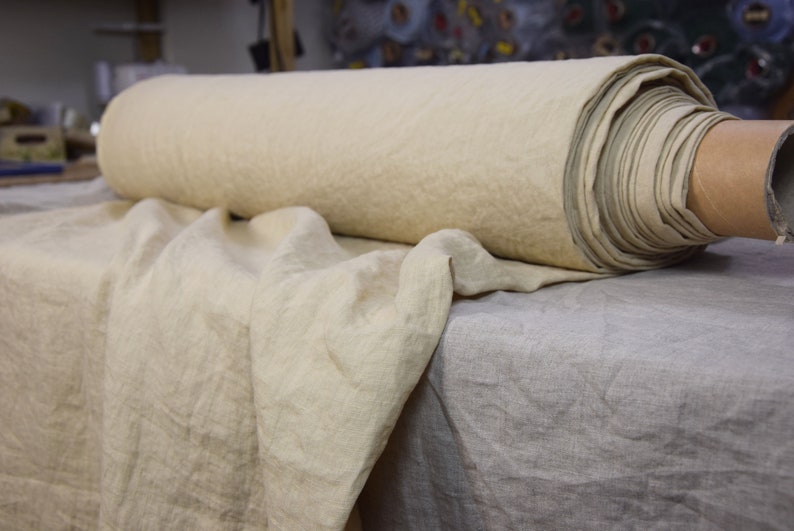 Pure linen fabric Regina Sesame. Light weight, not sheer. Pantone 15-1215 Tcx Sesame Color (beige color with some pale brownish-sand and greenish undertones). Drape characteristic are very good. Plain, densely woven. Pre-washed, naturally wrinkled.