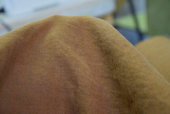 IN STOCK. Pure 100% linen fabric Gloria Aged Bronze 200gsm (5.90oz/yd2). Muted grayish copper tint. Aged look. Washed-softened.
