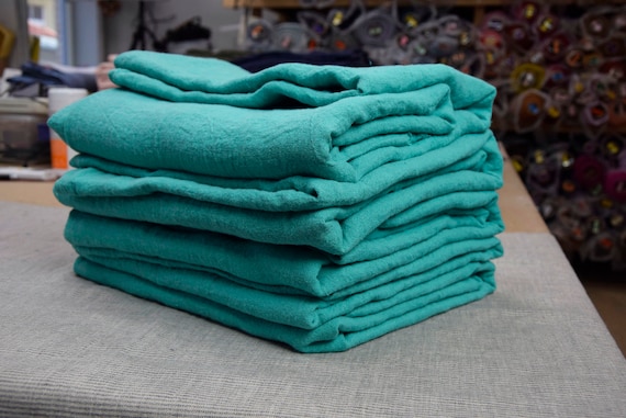 REMNANTS SALE!!! 100% linen fabric Julia Carnival Glass 210gsm(6.20 oz/yd2). Pantone 13-6030 TPG color, medium light shade of green-cyan.
