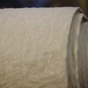 Pure linen fabric Regina Sesame. Light weight, not sheer. Pantone 15-1215 Tcx Sesame Color (beige color with some pale brownish-sand and greenish undertones). Drape characteristic are very good. Plain, densely woven. Pre-washed, naturally wrinkled.